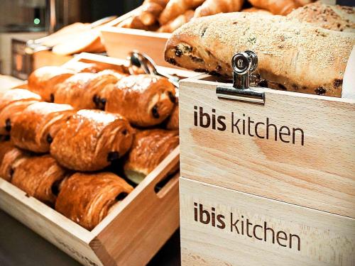 a display of lots of different types of bread at ibis Montpellier Centre Polygone in Montpellier