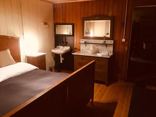 Postel nebo postele na pokoji v ubytování B&B Bären