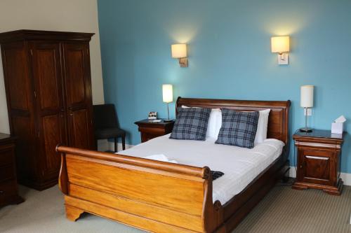 Ένα ή περισσότερα κρεβάτια σε δωμάτιο στο Craiglynne Hotel