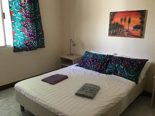 Ένα ή περισσότερα κρεβάτια σε δωμάτιο στο Anns Guesthouse BakauGambia