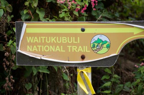 a sign for anatural trail in a forest at Soufriere Guesthouse in Soufrière