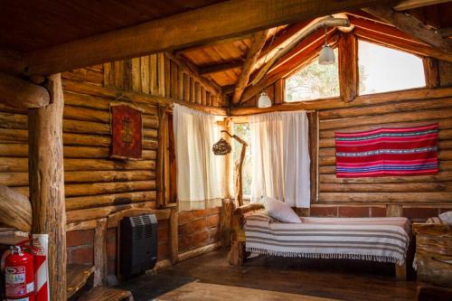 Una cama o camas en una habitación de Cabañas Las Moras