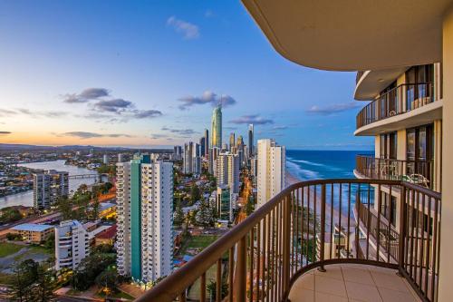 a view of the city from a balcony of a building at Surfers Aquarius on the Beach in Gold Coast