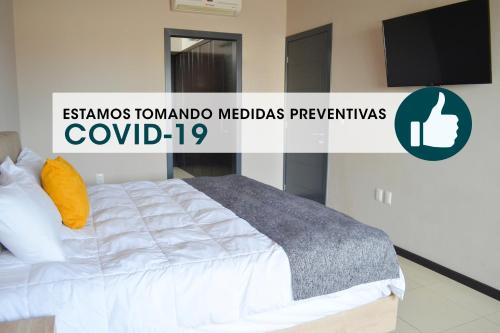 Ένα ή περισσότερα κρεβάτια σε δωμάτιο στο Bahia Marina Departamentos