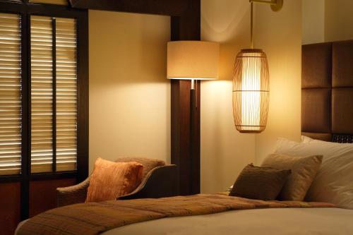 Ένα ή περισσότερα κρεβάτια σε δωμάτιο στο InterContinental Hanoi Westlake by IHG