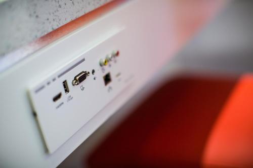 a close up of a button on a machine at Henley House Hotel in London