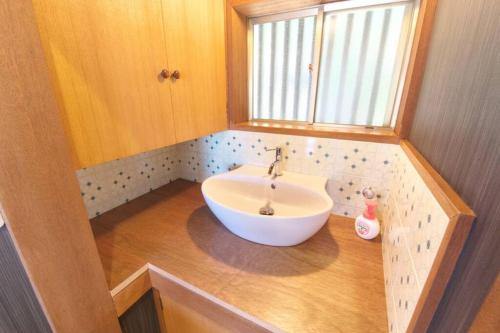 a bathroom with a sink in the middle of it at GOURA TERRACE in Gora