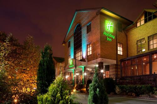 a hotel with green lights on the side of a building at Holiday Inn Rotherham-Sheffield M1,Jct.33 by IHG in Rotherham