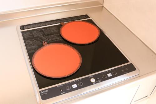 a tablet with two circles on top of it at SILVER SPRAY MtFuji view Yamanakako in Yamanakako