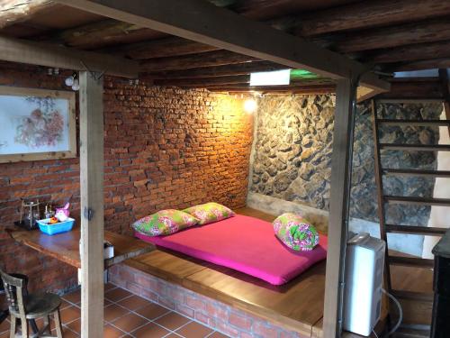 Katil atau katil-katil dalam bilik di Jiufen Xiaomei Meow Seaview Homestay