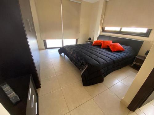 Un pat sau paturi într-o cameră la Villa Orestis Sand Beach