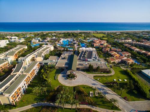 an aerial view of a resort near the ocean at Holiday Village Türkiye in Dalaman