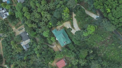 an overhead view of a house in a forest at Desire Village Rakwana in Rakwana