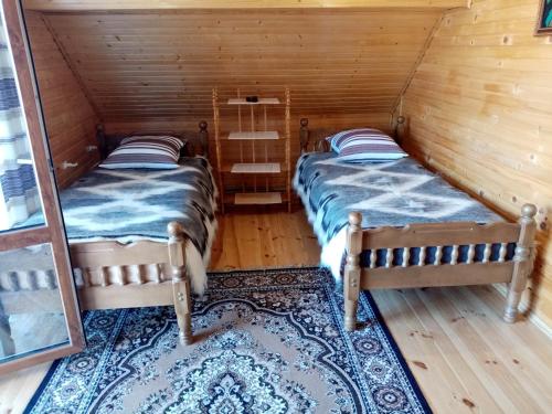 Postel nebo postele na pokoji v ubytování Садиба Федорчуків Гірська хатина