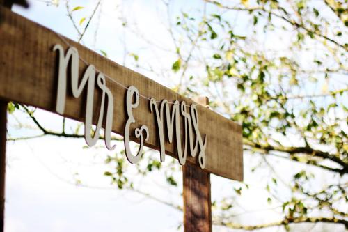 a wooden sign with the name of a street at Premier Hotel The Richards in Richards Bay