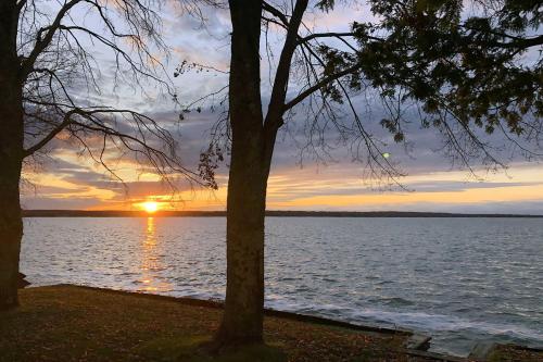 Lakefront Retreat with Sandy Shores and Sunset Views!