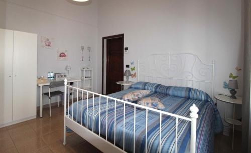 Postel nebo postele na pokoji v ubytování Le Cascine