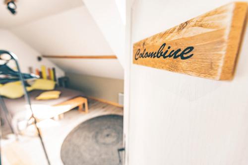 a sign that reads ambulance hanging on a wall at Chambres d'Hôtes les Colombes in Montmort-Lucy