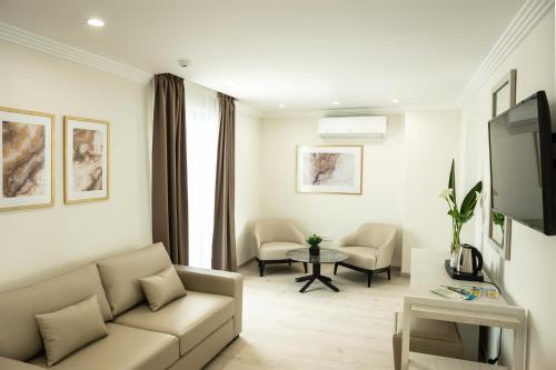 Χώρος καθιστικού στο Roseum Boutique Hotel