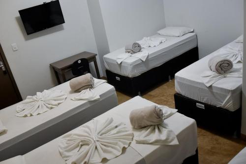 Postel nebo postele na pokoji v ubytování Tangará Hotel