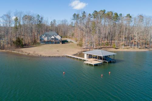 an aerial view of a house on a island in the water at Tranquil Point in Mineral