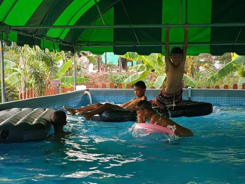 a group of people in a swimming pool at Touch the Wind in Chaiyaphum