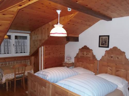 Postel nebo postele na pokoji v ubytování Hotel Pausa