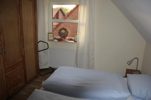Een bed of bedden in een kamer bij Gasthaus Eickholt Hotel-Restaurant