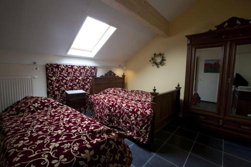 Кровать или кровати в номере De Oude School