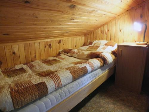 Postel nebo postele na pokoji v ubytování Chata Údolíčko