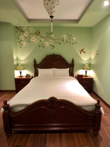 Le Grand Hanoi Hotel - The Orientalにあるベッド