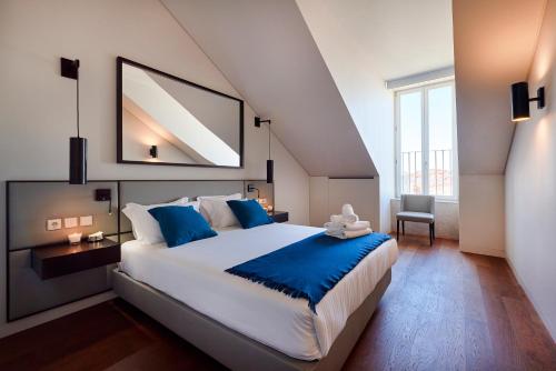 Katil atau katil-katil dalam bilik di Lisbon Five Stars Apartments 8 Building