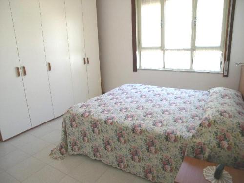 Un pat sau paturi într-o cameră la Villa Clivia
