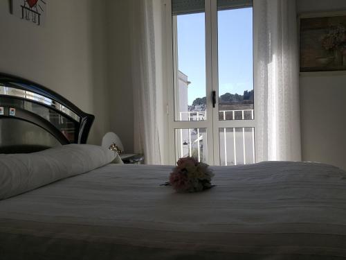 Кровать или кровати в номере La casa sui trulli