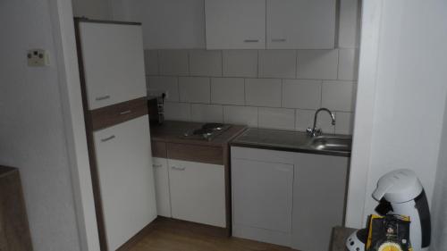 Dapur atau dapur kecil di Monteurwohnung Hagen Haus 1