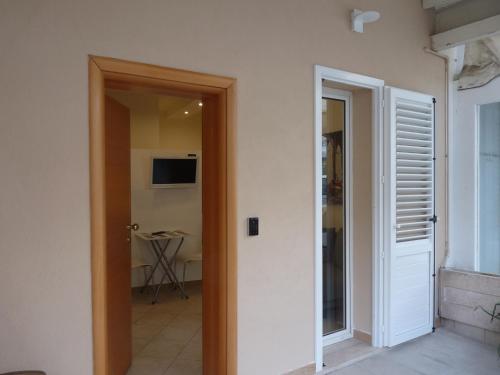 Μια τηλεόραση ή/και κέντρο ψυχαγωγίας στο Hotel Villa Edda