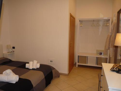 Ένα ή περισσότερα κρεβάτια σε δωμάτιο στο Hotel Villa Edda