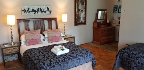 Ένα ή περισσότερα κρεβάτια σε δωμάτιο στο Dias Guest House
