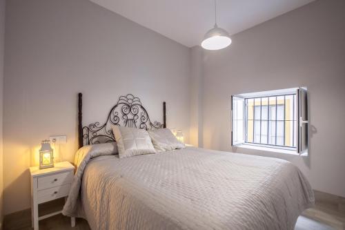 Postel nebo postele na pokoji v ubytování APARTAMENTO CASCO ANTIGUIO ↑ CALIDADES 4 PX 1 BR