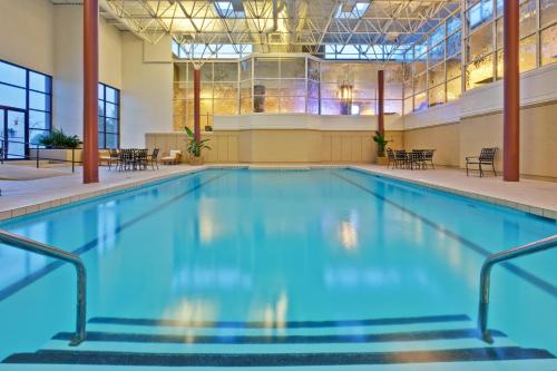 
a large swimming pool in a hotel room at Crowne Plaza Chicago O'Hare Hotel & Conference Center, an IHG Hotel in Rosemont
