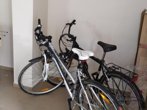 two bikes parked next to each other in a room at Szilvia Panzió Gyomaendrőd in Gyomaendrőd