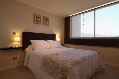Voodi või voodid majutusasutuse Alto Sporting Apartments toas