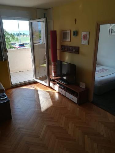 Posteľ alebo postele v izbe v ubytovaní Apartman Stanić
