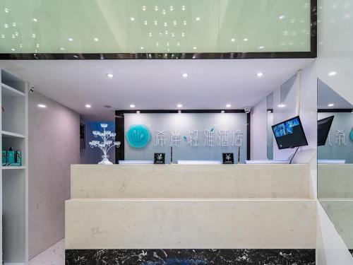 Lobbyn eller receptionsområdet på Xana Hotel Guiyang International Convention and Exhibition Center Financial City Store