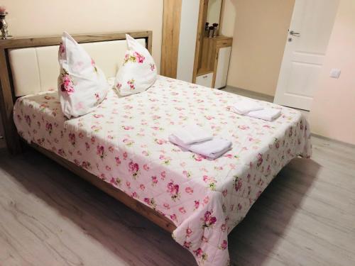 Ein Bett oder Betten in einem Zimmer der Unterkunft Noblesse Hause