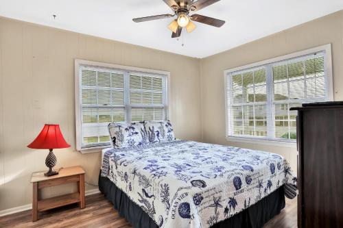 Кровать или кровати в номере Seaside Cottage