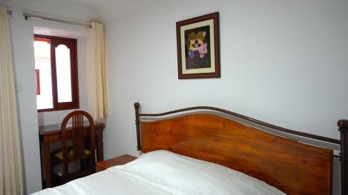 Casa Kuelap Hostalにあるベッド