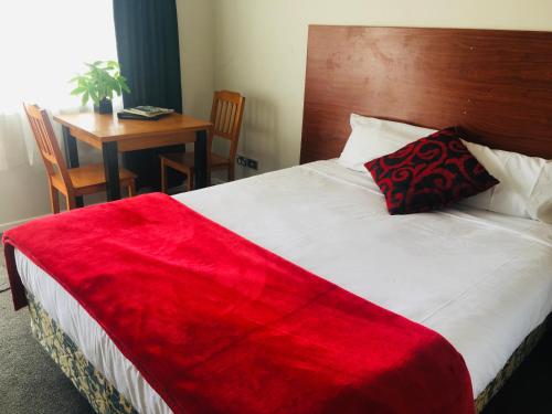 Katil atau katil-katil dalam bilik di 136 St George Motel
