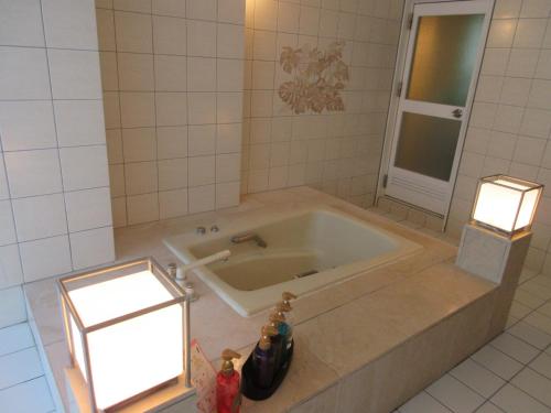 Ett badrum på Ocean Hotel adult only - former Kagoshima Intelligence