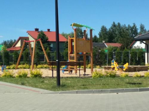 Детска площадка в Apartamenty Oleńka II - Szczytno Mazury
